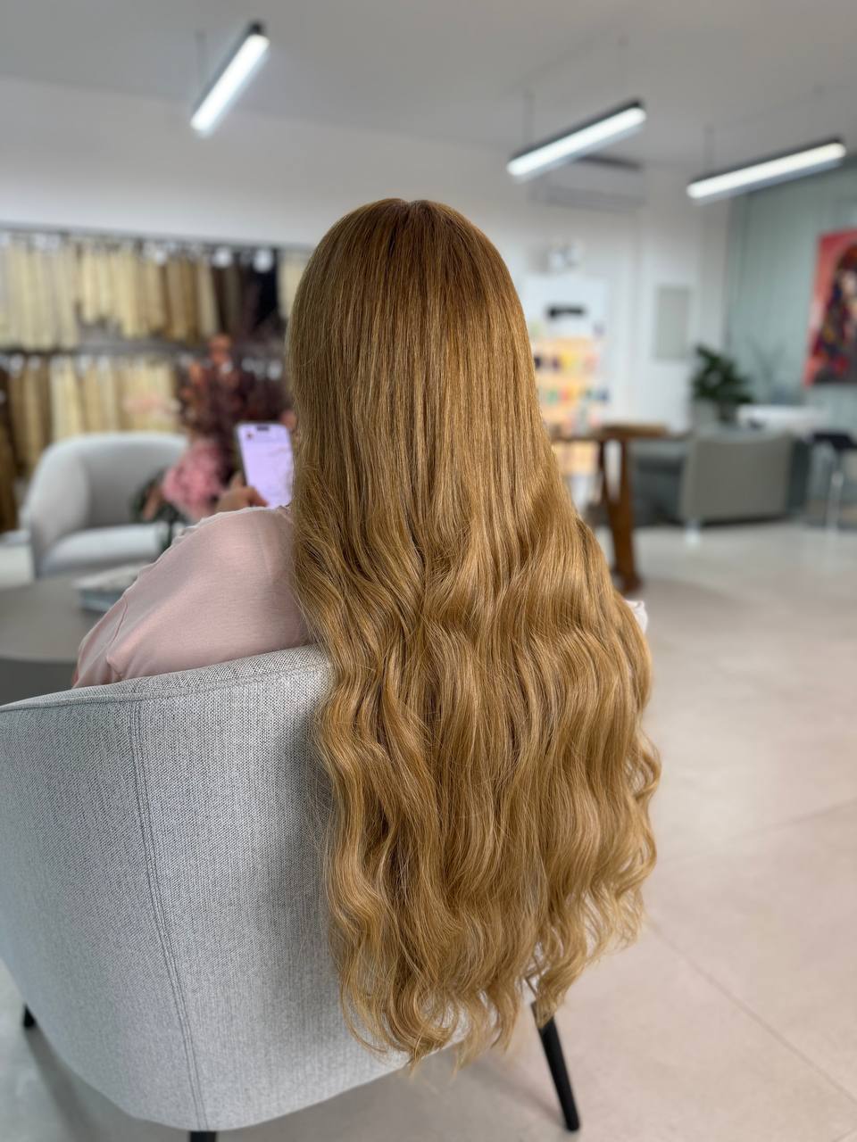 Long golden hair extensions styled at Nicehair Ladies Salon, Al Sufouh 1, Dubai